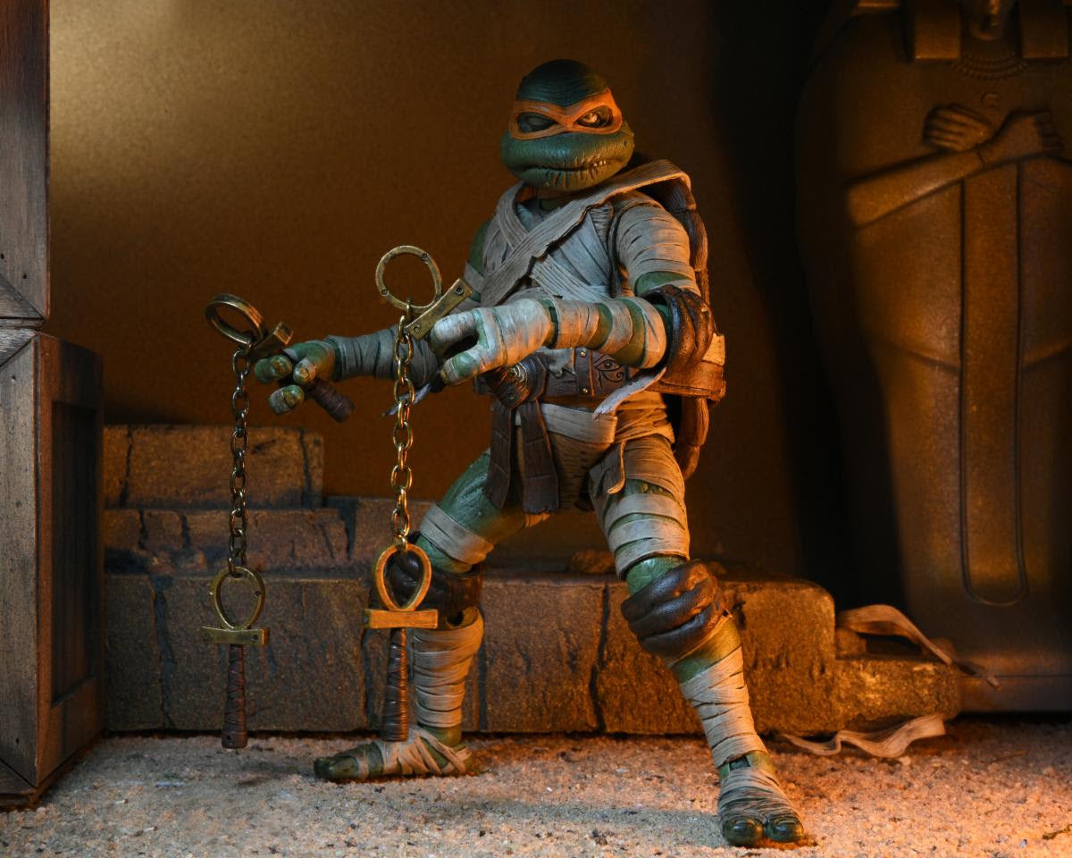 NECA - Universal Monsters x Teenage Mutant Ninja Turtles - 7" Scale Action Figure - Ultimate Michelangelo as The Mummy